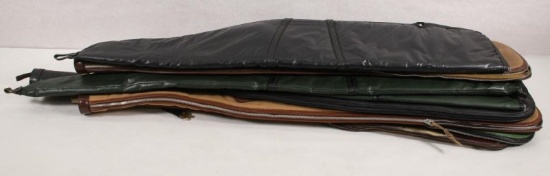 8 soft sided gun cases, assorted sizes and manufacturers.