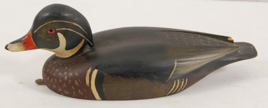unmarked wooden decoy, approx 14.75" long, small nick on wing tip