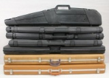 7 assorted manufacturer and size padded hard sided gun cases