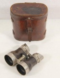 Pair of CHEVALIER Paris field glasses in leather case