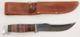 Case XX #323-6 swept back knife in leather sheath