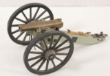 Miniature breech loading brass desk cannon on wooden carriage