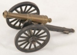 brass desk cannon on cast iron base