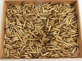 Hundreds of brass Lake City headstamp and other 5.56 fired cases.