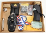 Flat lot to include hinged hand cuffs no key, Wilson combat spring kit, S&W tool chest 3, medals,