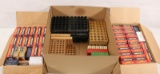 Assorted reloading blocks and dozens of empty 40 S&W & 45 auto boxes
