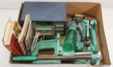Flat lot to include RCBS press, Uniflow dispenser, scales, books and parts bin