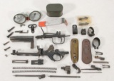 asstd flat lot rifle parts and pr. goggles with tin