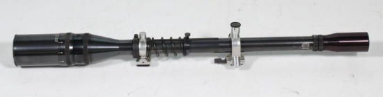 J. Unertl 15x scope with 1" tube having both covers and mounts that attach to rifle