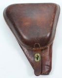 Brown leather hard shell type 14 Nambu holster with tool in very good condition.