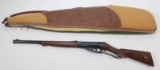 very nicely tooled leather padded rifle