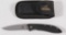 Gerber single blade folding knife with cloth sheath approximately 3