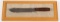 Russell Green River knife on plaque, 12.5