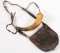 Period powder horn and leather essentials bag showing some wear with repair to horn bung