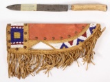 Indian beaded leather sheath with Meriden Company knife, having 12.75