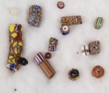 Riker mount of glass Indian trade beads (16) total pieces. Part of the Geor