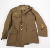 US Army uniform with assorted patches to include WW2 CBI, honorable discharge