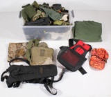 box lot with Camelbak, shotgun shell holder, canteen holder, gloves and soc