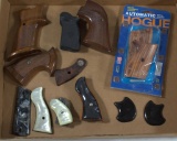 lot of assorted handgun grips to include one pair