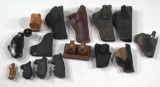 Lot of (11) assorted holsters - two leather for