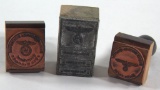 (3) German Nazi ink stamps, one is aluminum