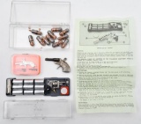 Lot of three miniature pistols to include