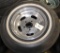 4 chrome slotted wheels w/Summit 215/75-14 tires