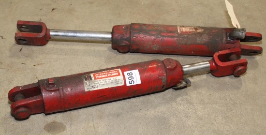 Pair of International hydraulic cylinders