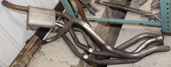 6 tail pipes- 2 with mufflers