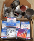 box of thermostat housings & 15 new thermostats