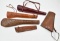 lot of assorted smooth and tooled leather scabbards, some being lined, some having carrying straps, 