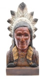 carved wooden Indian bust with headdress, signed on back, measures 26.5