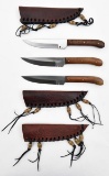 (3) fixed blade knives in tooled leather scabbards with each having 4.675