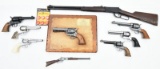 lot to include (7) model and toy revolvers consisting of C.C. Mathies tribute plaque, real weight, c