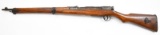 * Japanese Arisaka training rifle having anchor and leaf stamping on top of receiver at barrel with 