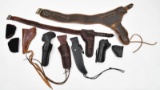 (2) shooting belts with holsters, (4) leather holsters, (1) leather sheath and IWB & pocket holsters