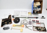 Assorted lot of firearm cleaning supplies to include 100s of patches, brass brushes, scotch pads, Ho