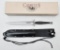 Camillus Marine Raider fighting knife in original box with leather sheath having a 7