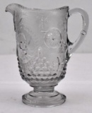 Admiral Dewey pressed glass footed water pitcher approximately 9