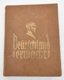 WWII Nazi Deutshland Erwacht cigarette card album with only nine cards missing