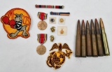 lot of WWII Marine Corp pins, patches along with medals and (6) WWII headstamp .50 BMG rounds of amm