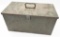 large steel storage chest showing surface rust in