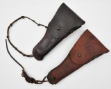 (2) US WW2 leather side arm holsters, one