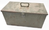 large steel storage chest showing surface rust in