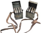 (2) Steel cases with leather straps containing four FAL style detachable box magazines.
