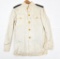 WWII U.S. Navy Officers dress whites, tunic & pants. Showing assorted storage and handling wear....