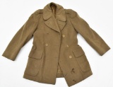 WWII U.S. Officers Short Overcoat. Showing assorted storage & handling wear....