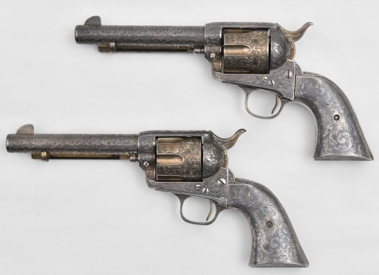 *Fantastic pair of Engraved Colt single action revolvers.