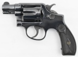 Smith & Wesson Model 38 HE 5 screw double-action revolver.