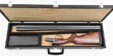 Cased Miroku side by side 12 gauge shotgun, break-action.